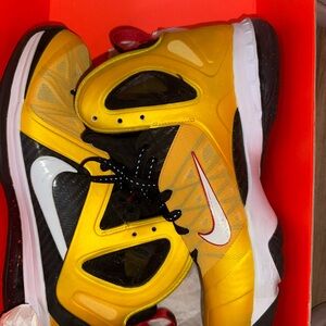 Nike men’s Yellow and Black Sneakers